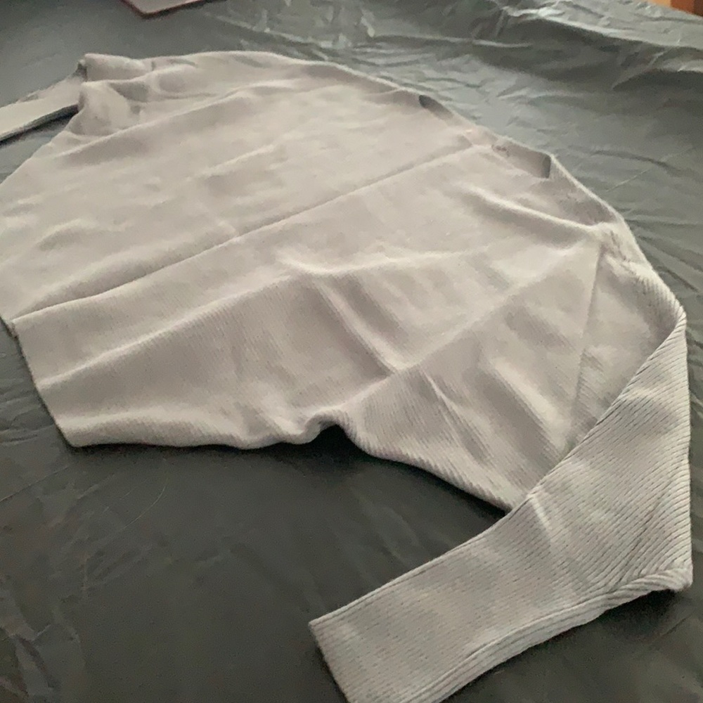 Gray sweater.